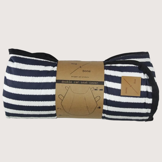 Navy and white striped car seat cover with a cardboard label on a white background