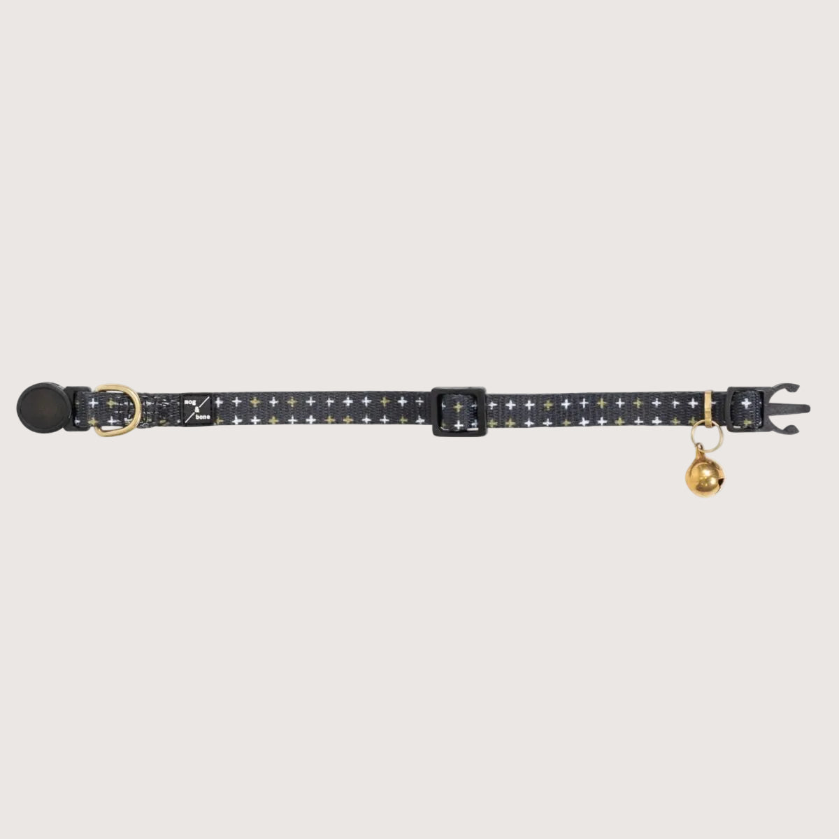 Cat collar with gold bell and black pattern on a white background