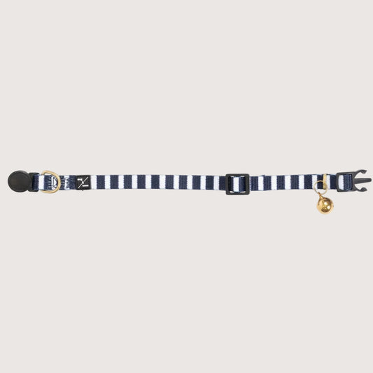 Navy and white striped cat collar with gold bell on a white background
