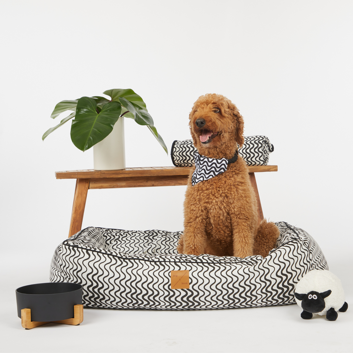 Bolster Dog Bed - Black Wave Print