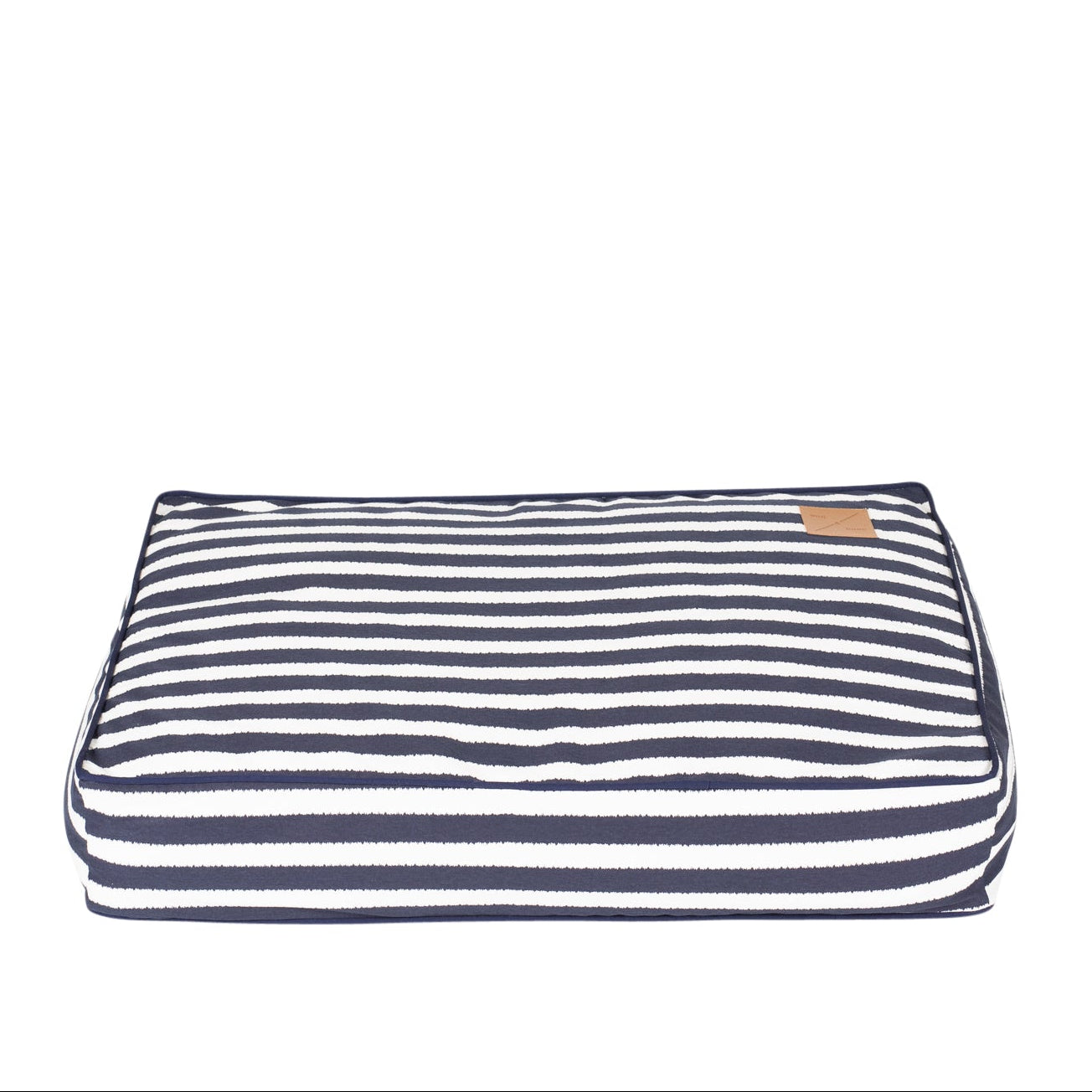 Navy and white striped pet bed on a white background