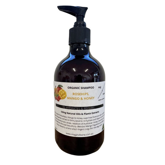 Bottle of organic shampoo with a pump on a white background