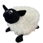 Plush toy sheep with black face and legs on a white background