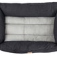 black denim pet bed with a soft grey cushion on a white background
